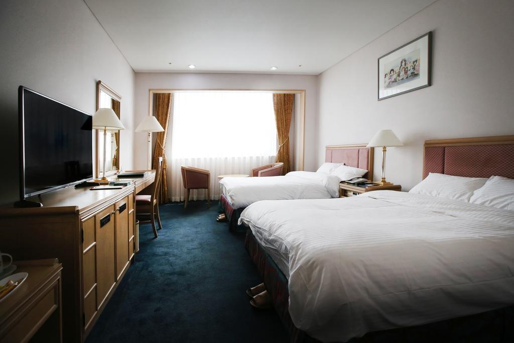 Legend Hotel Теджон Номер фото